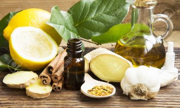 37727132-alternative-medicine-with-lemon-pollen-cinnamon-ginger-and-garlic.jpg